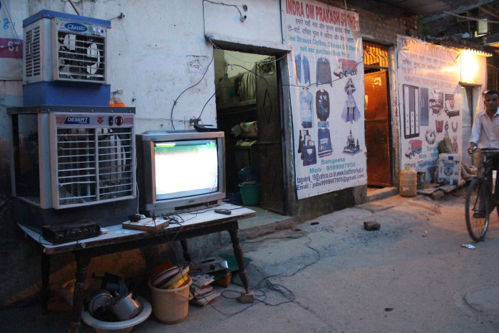 Sangeeta’s junk shop cum open air video parlour in Munirka Village. Image courtesy: Shatavisha Mustafi 